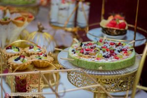 healthy fruit parfait, watermelon with granola, fruit tree, stuffed pineapple, tasty desserts for events, chop sticks