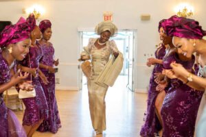 Nigerian couple in Canada traditional wedding, white agbada, champagne gold silk aso oke, walking stick, fila, coral and ivory bead iyun, bride's grand entrance at engagement, aso oke, bride style