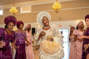 Nigerian couple in Canada traditional wedding, white agbada, champagne gold silk aso oke, walking stick, fila, coral and ivory bead iyun, bride grand entrance, bridal style for engagement wedding,