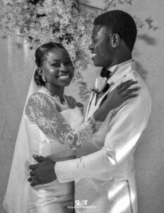 Nigerian couple white wedding gown and white suit wedding day photoshoot