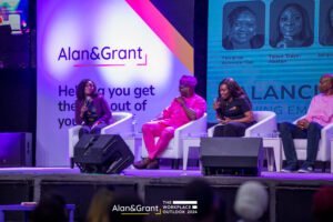 Eventigo The workplace outlook conference, stage design with LED screen, stage props, banners, lounges, white couch, side stools event planner in Lagos