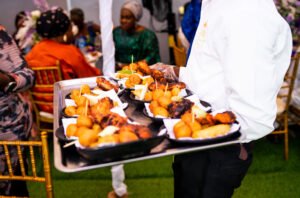 Nigerian small chops, puff puff, grilled chicken, samosa, spring roll