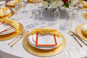 Construction company PERI Open day and 10th year anniversary, corporate events, corporate event planner in Lagos, Nigeria, table scape setting red and yellow menu card, napkin